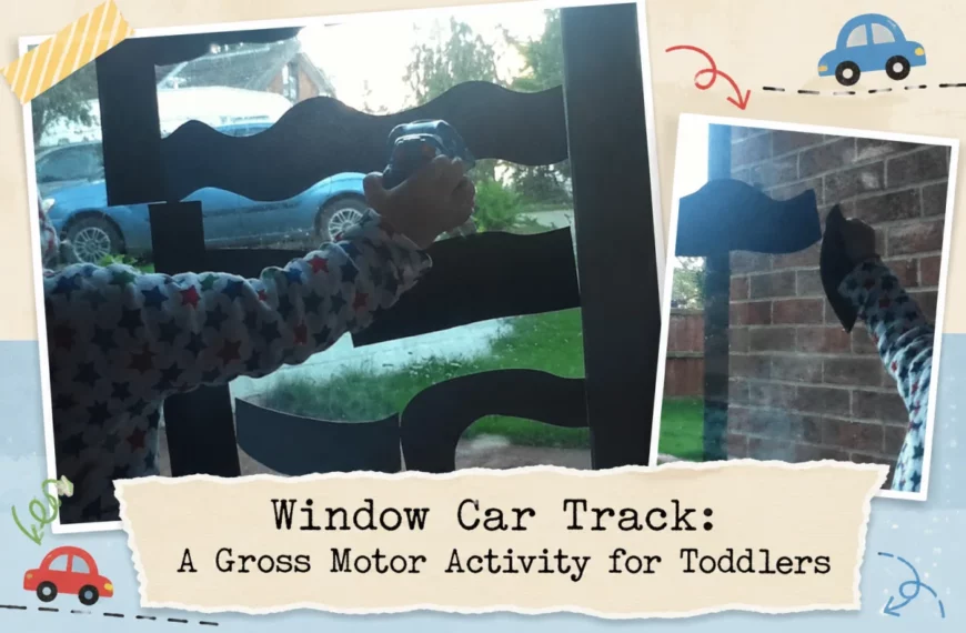 A toddler driving a toy car along craft-foam road shapes stuck to a window.